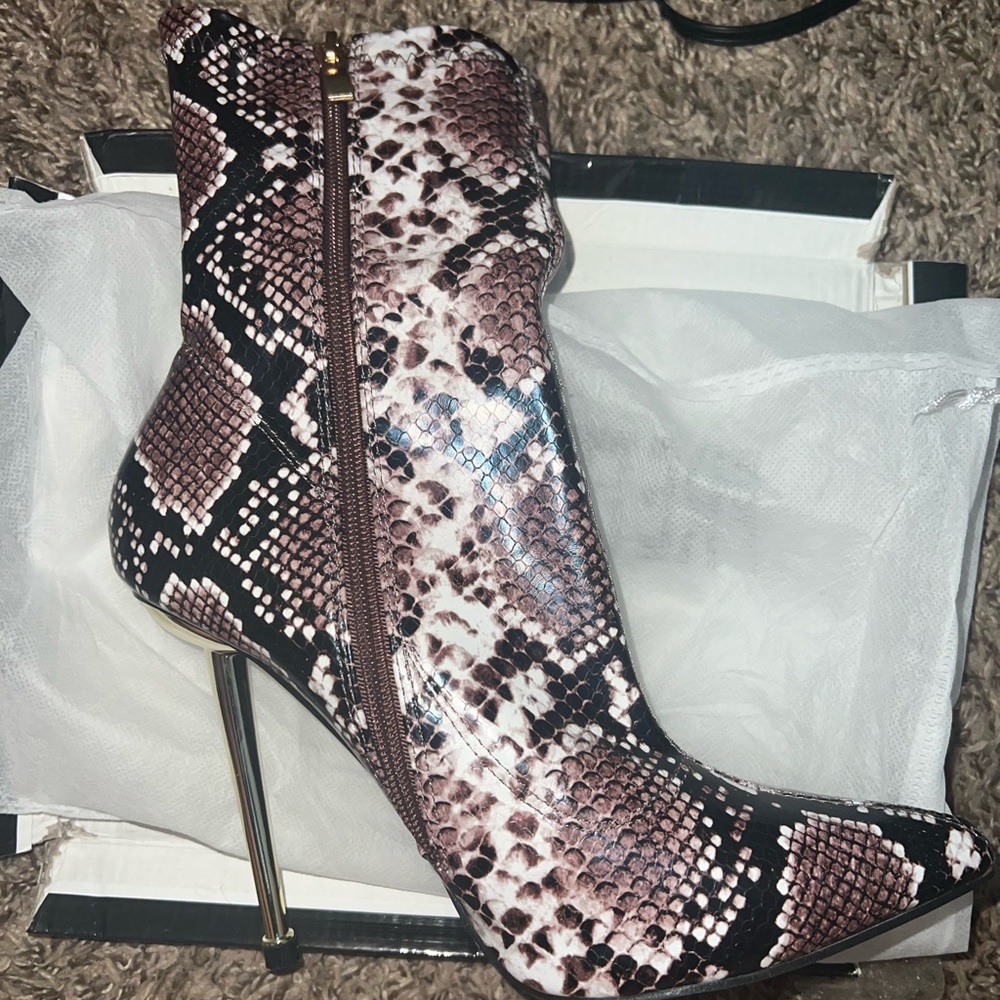 Brown snakeskin booties